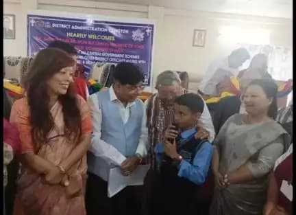 Union MoS Dr. Subhas Sarkar interacting  with a student on the mid day meal provided at school in Gangtok today- part3