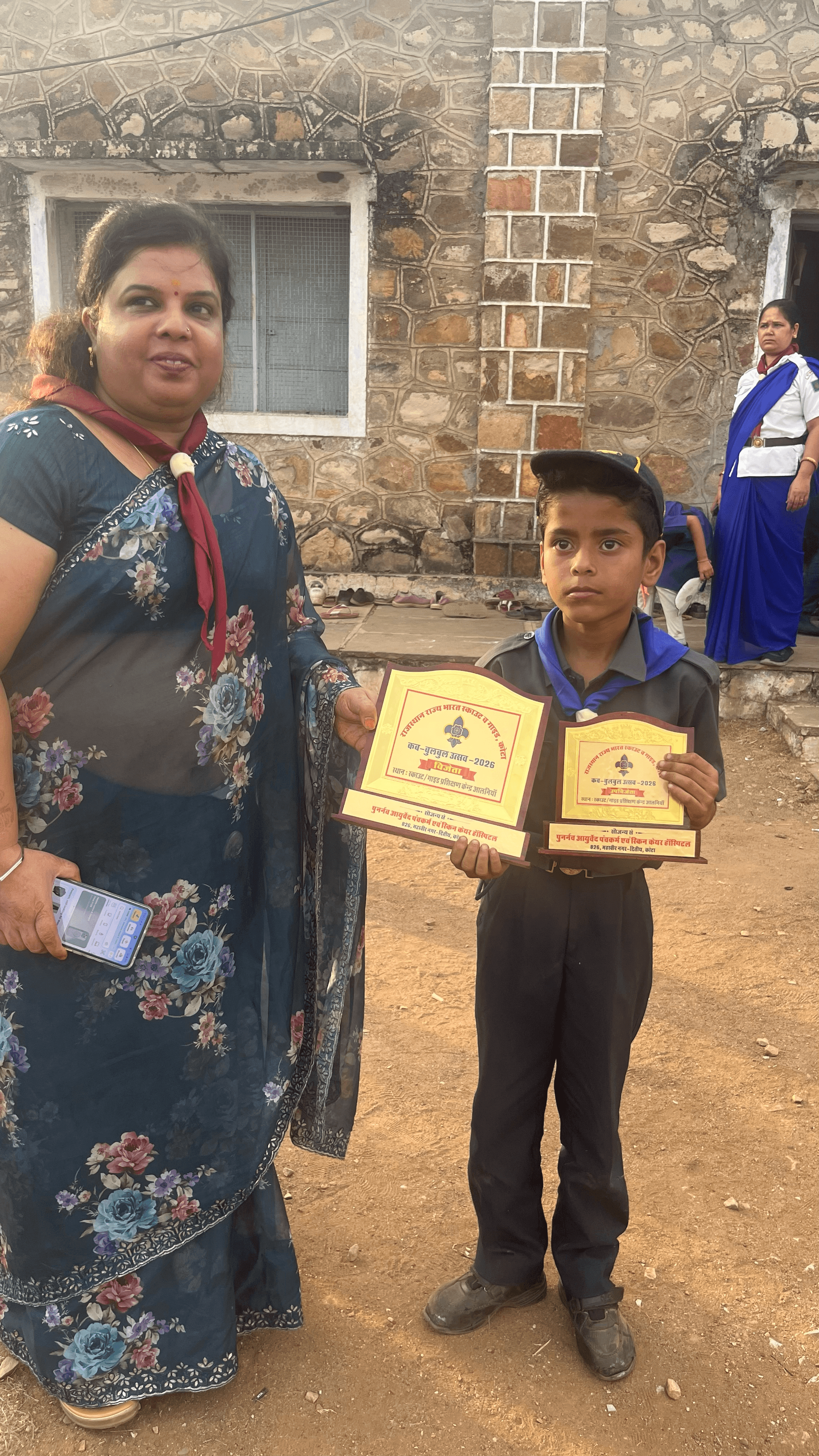 Trophy serve by hospital Director madam POONAM VIJAY  To scout guid kota