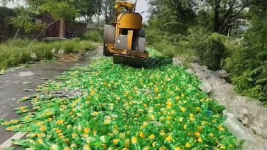 बलिया मोड़ पर एक्सपायर कोल्ड ड्रिंक को बुलडोजर से क्षतिग्रस्त किया गया